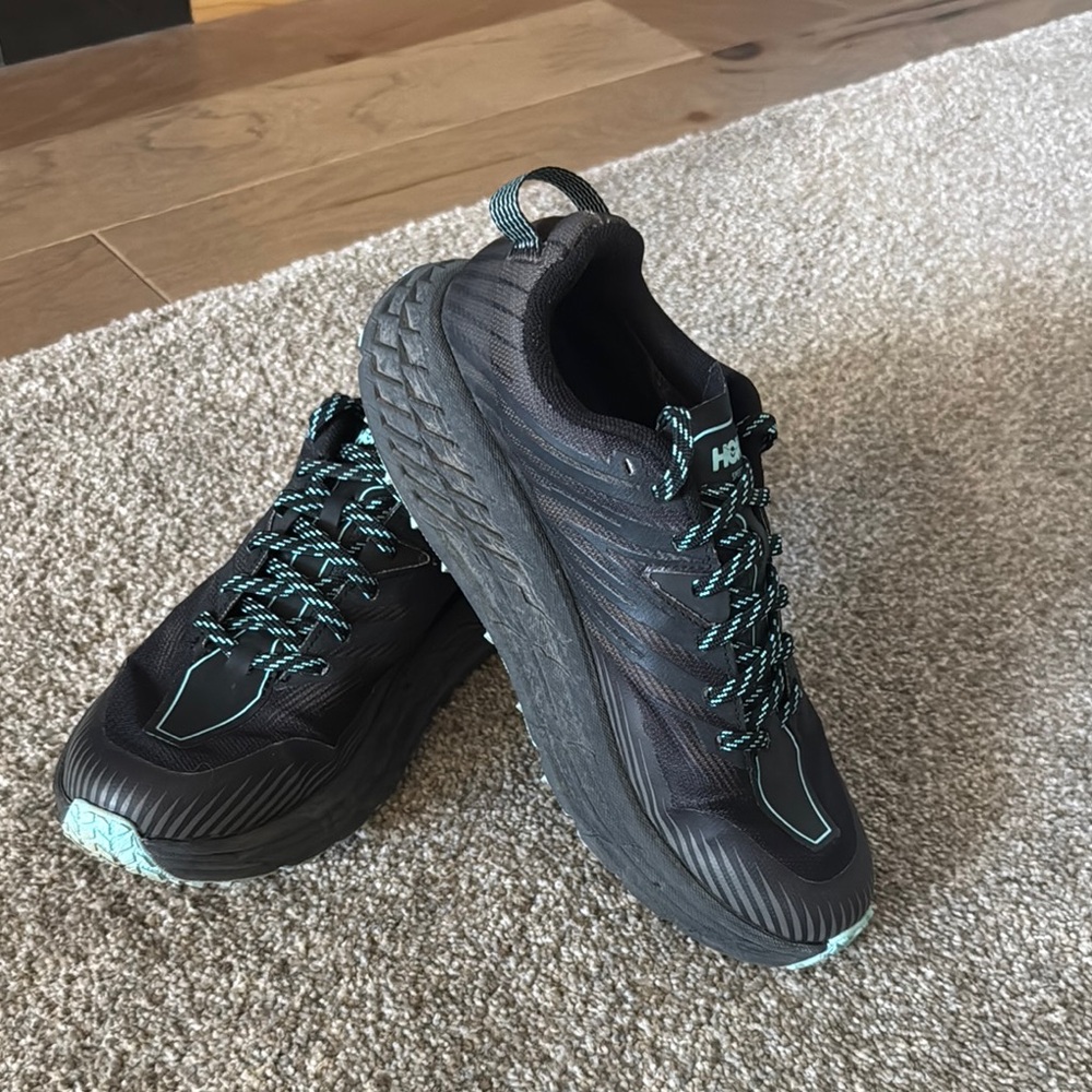 Hoka Speed Goat 4 - Women's Black and Teal Running Shoes